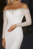 Robe de mariée à manches longues ivoire fourreau à épaules dénudées scintillante