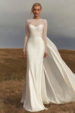 Robe de mariée à manches longues en satin satiné ivoire avec ruban