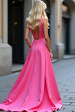Robe de bal en satin fuchsia à encolure en V découpée