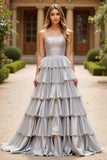 Robe de bal longue en taffetas argenté avec volants
