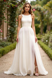 Robe de mariée longue en mousseline de soie ivoire avec fente