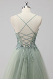 Robe de soirée en tulle à paillettes vertes avec lacets dans le dos