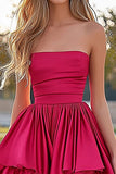 Robe de bal trapèze fuchsia sans bretelles à volants en satin plissé haut-bas