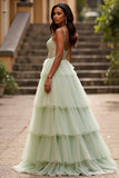 Robe de bal longue à volants vert clair scintillante à volants avec paillettes