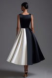 Robe à cravate noire en satin à col bateau
