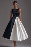 Robe à cravate noire en satin à col bateau