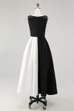 Robe à cravate noire en satin à col bateau