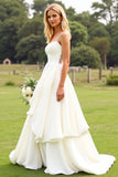 Robe de mariée ivoire à volants en mousseline de soie avec dentelle