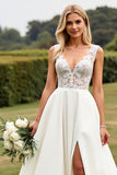 Robe de mariée ivoire en dentelle trapèze col V avec fente