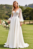 Robe de mariée en dentelle à manches longues ivoire avec appliques