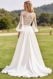 Robe de mariée en dentelle à manches longues ivoire avec appliques