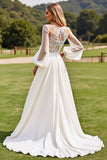 Robe de mariée en dentelle à manches longues ivoire avec appliques