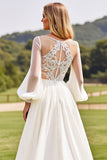 Robe de mariée en dentelle à manches longues ivoire avec appliques
