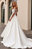 lvory Une ligne dénudée d’épaule Robe de mariée longue appliquée