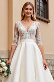Une ligne demi-manches lvory dentelle robe de mariée longue