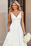 Robe de mariée longue à volants à bretelles spaghetti trapèze blanche
