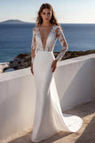 Robe de mariée ivoire en dentelle sirène à manches longues