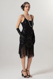 Robe à clapet noire dorée à paillettes des années 1920 avec pompons