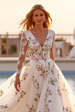 Robe de mariée blanche à la trapèze avec appliques