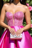 Robe bustier fuchsia en satin une ligne de retour