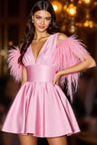 Robe de bal rose mignonne avec des plumes