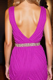 Robe courte moulante perlée fuchsia scintillante