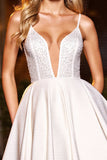 Robe de retour à la maison à paillettes blanches