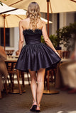 Robe courte noire à franges