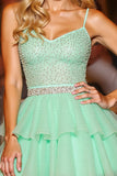 Robe courte de bal en tulle vert scintillant à volants