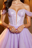 Robe de bal à épaules dénudées de perles scintillantes
