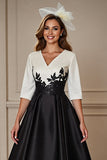 Noir et blanc Une ligne haute basse mère de la mariée robe avec appliques