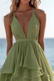 Robe d’été verte à volants à col en V
