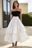 Robe longue formelle sans bretelles à volants noir et blanc