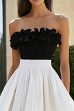 Robe longue formelle sans bretelles à volants noir et blanc