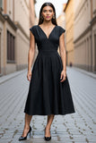 Robe de travail mi-longue en satin noir à col en V