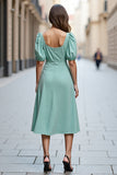 Robe de travail midi en satin vert menthe à volants A Line