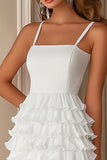 Petite robe blanche à volants en mousseline de soie à volants