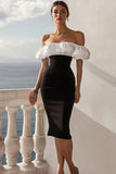 Robe de cocktail mi-longue moulante en satin noir et blanc