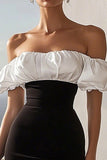Robe de cocktail mi-longue moulante en satin noir et blanc