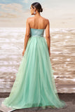 Robe de bal sans bretelles en tulle vert avec noeud