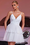 Robe à bretelles spaghetti blanches avec appliques
