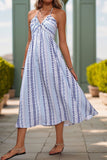 Robe d’été bleu clair imprimée dos nu une ligne