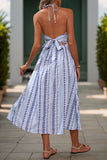 Robe d’été bleu clair imprimée dos nu une ligne