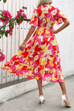 Robe d’été fuchsia à imprimé floral avec ceinture