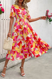 Robe d’été fuchsia à imprimé floral avec ceinture