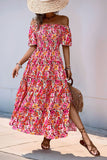 Robe d’été à épaules dénudées à fleurs fuchsia