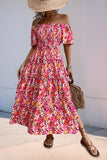 Robe d’été à épaules dénudées à fleurs fuchsia