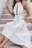 Robe d’été dos nu à pois noirs blancs avec nœud
