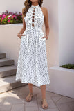 Robe d’été dos nu à pois noirs blancs avec nœud