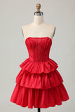 Robe de cocktail verte trapèze bustier à volants et perles avec nœud